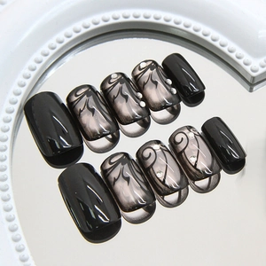 Dark vine press-on nails with sparkling rhinestones on a mirror surface set