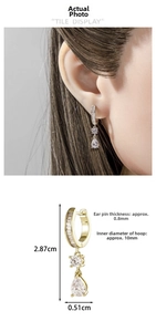Detail of drop earrings with marquise stones and gold finish showing precise dimensions