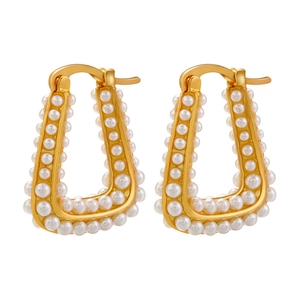 Detailed close-up of 18K gold-plated trapezoid hoop earrings with faux pearl pavé inlay