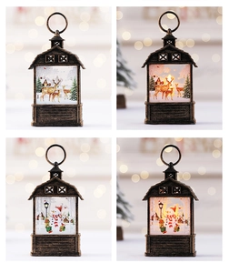 Detail view of retro bronze Christmas lanterns with reindeer and snowman patterns