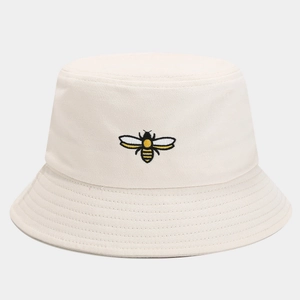 Close-up of premium bee embroidery detail on a breathable cotton bucket sun hat