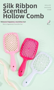 Macro shot of three hollow massage combs in pink and white with scented ribbon design
