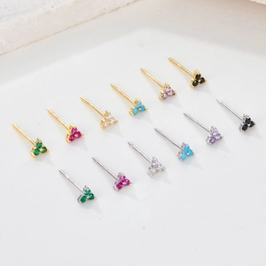 Macro shot of colorful zircon S925 sterling silver flower stud earrings in various finishes