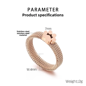 Detail of 4mm rose gold mesh stainless steel ring featuring a 7mm cute paw decoration