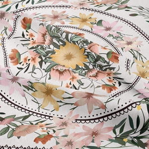 Close-up of bohemian floral tapestry fabric showing soft texture and detailed print folds