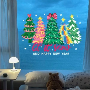 Stickers de Noël pour fenêtres avec texte let it snow sur surface vitrée pour déco