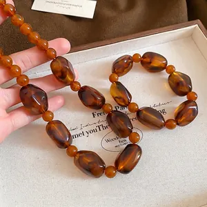 Retro amber acrylic irregular bead necklace set with tortoiseshell texture for women