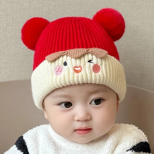 Detailed knit texture and cute embroidered face on the baby winter warm earflap hat