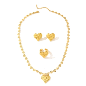 Vintage gold heart jewelry set with textured necklace, earrings, and ring for women