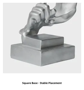 Detailed view of the square silver base ensuring stable placement for modern sculptures
