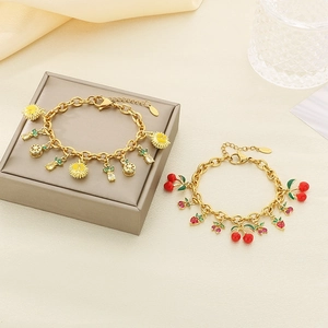 Gold-plated stainless steel bracelet with colorful zircon fruit charms and enamel details