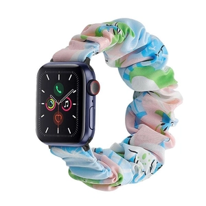 Detailed view of floral scrunchie watch band with blue and pink patterns for smartwatch