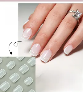 Detailed view of short French tip press-on nails with white classic curved edge JP2485