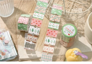 Detail of floral collage scrapbooking tape with rabbit and forest patterns for DIY crafts