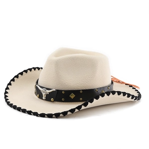 Detail of western beige felt hat with bull head belt and studded leather band