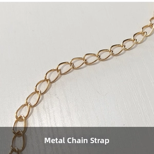 Detailed close-up of premium polished gold metal chain strap for women handbags