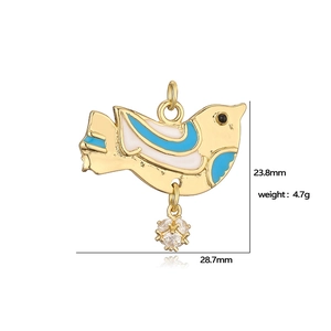 Golden enamel bird pendant necklace with blue and white details and clear zircon drop