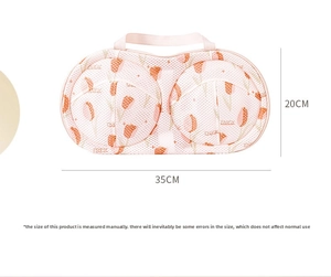 Detail of tulip patterned mesh laundry bag for bras with dimensions 35cm by 20cm