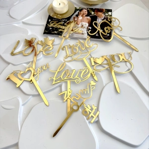 Set of 7 golden acrylic cake toppers with Love and I Love You designs for weddings