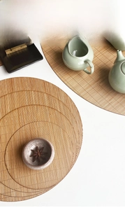Detail of woven bamboo placemat texture with traditional Chinese Kung Fu tea set decor