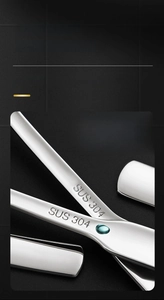 Detailed view of SUS 304 stainless steel stamp on a polished square handle spoon