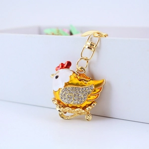 Golden rooster keychain with sparkling rhinestones and colorful enamel detailing