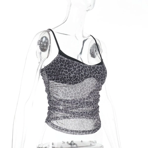Detail view of leopard print mesh camisole with ruched sides and sheer polyester fabric
