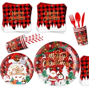 Close-up of Christmas tableware featuring Santa, snowmen, and red plaid patterns