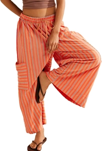 Detail of colorful striped wide leg pants featuring drawstring waist and side cargo pocket