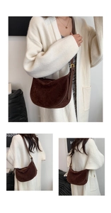 Detail view of deep brown hobo bag showing matte suede texture and adjustable strap