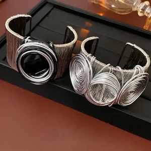 Artistic multi-layer wire wrapped cuff bracelet in silver and black metal colors