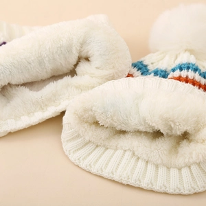 Winter kids knit hat and scarf set with colorful stripes and cozy fleece lining