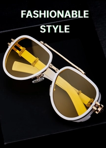 Detail of retro punk sunglasses featuring yellow lenses and gold metal accents
