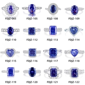 Selection of 16 styles of blue gemstone rings in silver settings with various cuts
