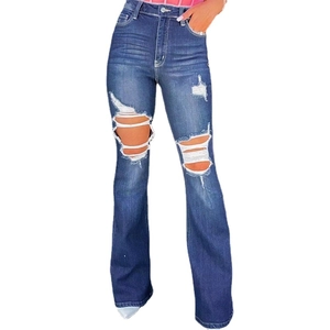 Women's high waist ripped flare jeans in dark blue wash with distressed hole details