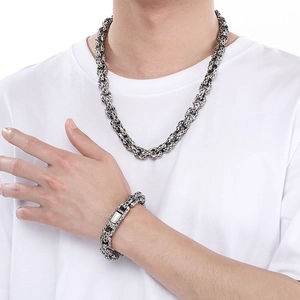 Retro hammered stainless steel chain necklace and bracelet set for men on model