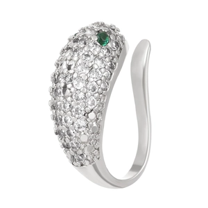 Detailed macro view of silver zircon ear cuff with sparkling green gemstone accents