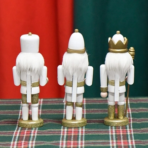 Three 15cm white and gold wooden nutcracker soldier ornaments set for Christmas decor