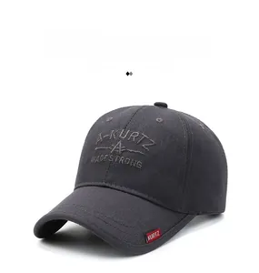 Detail of dark grey cotton baseball cap with A-KURTZ embroidery and red brand label