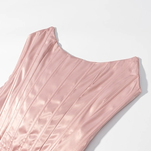Pink satin corset top with structured boning and elegant silk texture for women