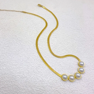 Elegant gold-plated stainless steel snake chain necklace featuring five round pearl charms