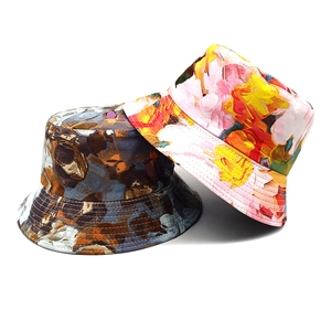 Double-sided reversible bucket hat with colorful floral and abstract oil painting patterns