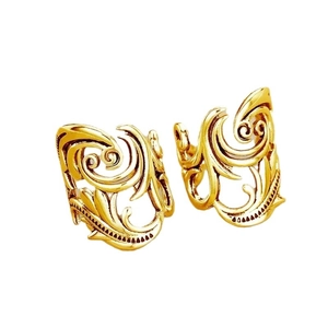 Vintage gold leaf ear cuffs with intricate hollow vine patterns in bohemian style