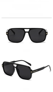 Detailansicht der Pilot-Sonnenbrille mit Doppelsteg und goldenen T-Scharnieren in Schwarz