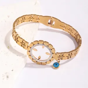 Gold hollow geometric titanium steel bracelet with devil eye pendant and sparkling rhinestones