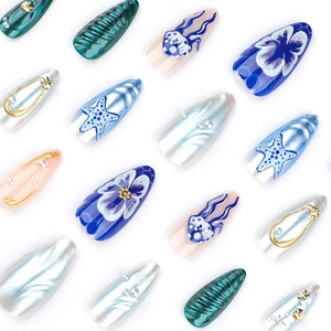 Short almond press-on nails with 3D ocean theme, pearls and starfish seashell patterns