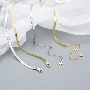 Elegant 925 sterling silver snake chain necklace in gold and silver finishes with heart tag
