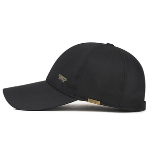 Men's black baseball cap with extended brim and gold metal sport emblem detail