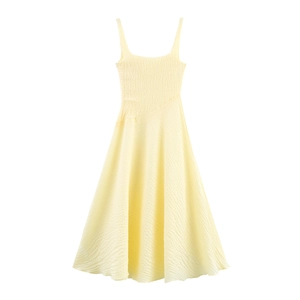 Light yellow textured crinkle midi dress with spaghetti straps and irregular hemline