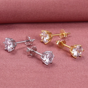 Close-up of S925 sterling silver stud earrings featuring six-prong cubic zirconia setting